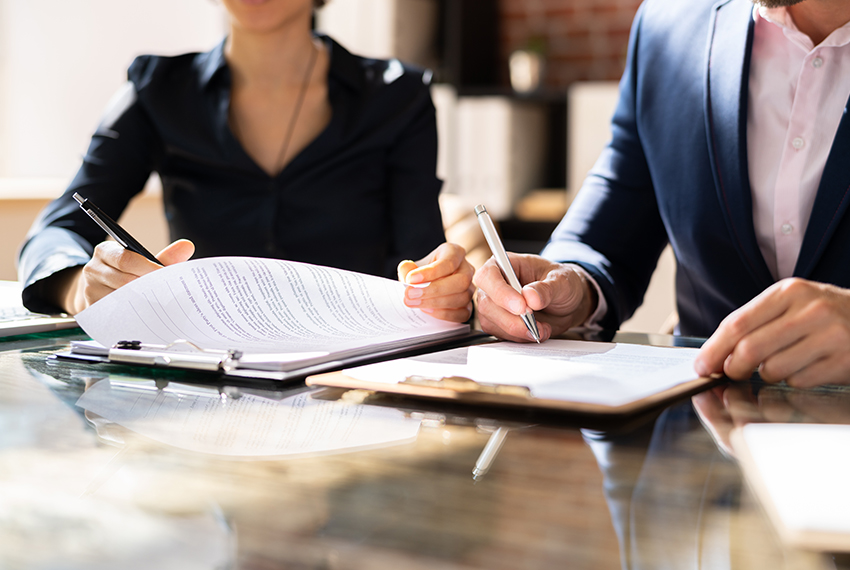 business people reviewing paperwork